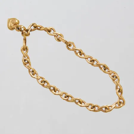 Armband med diamant 1 x ca 0,01ct, längd ca 18,5cm, bredd 5,5mm, integrerad berlock hjärta, 18K Vikt: 20,9 g