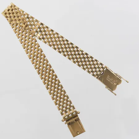 Armband, Korridorlänk, Ceson Guldvaruaktiebolag, Göteborg år 1965, längd: 19,5 cm, bredd: 12 mm, 18K guld. Vikt: 23,9 g