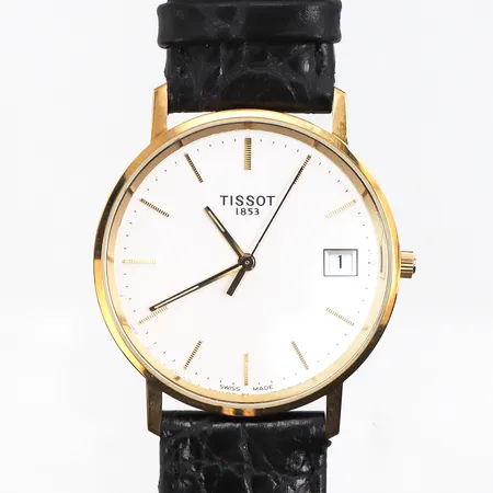 Herrur Tissot,företagsgravyr 2001,fungerar ej,diameter ca 33.4 mm,18k.