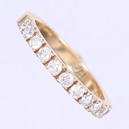 Halvalliansring med diamanter 11x ca 0,04ct totalt ca 0,44ctv stl:16¾, bredd 2,5mm, 18K Vikt: 3,2 g
