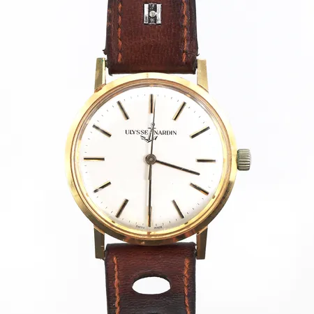Herrur Ulysse Nardin,tickar igång men ej funktionstestat,ojämnhet på baksidan,gravyr,diameter ca 34 mm,18k.