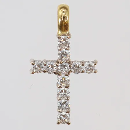 Hänge kors med diamanter 11 x ca 0,05ct ca 0,55ctv 22x12mm ink ögla ögla i gult guld behov av omrodiering vitguld 18K.  Vikt: 1,7 g