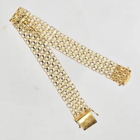 Armband X-länk längd 19 cm, bredd 13 mm, mindre ojämna länkar, 18K. Vikt: 14,9 g