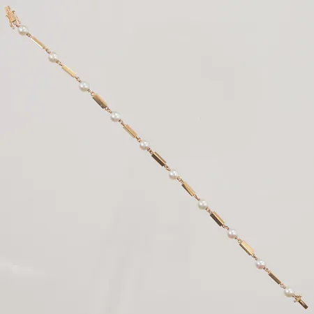 Armband med pärlor 18,5cm bredd 2-5mm 18K 7,8g.