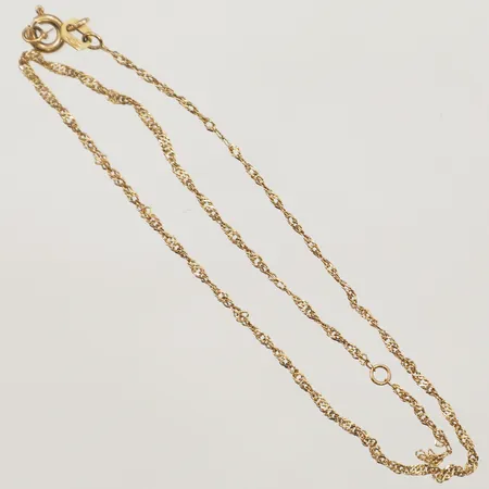 Vristlänk, längd 26cm, bredd 0,4mm,defekt lås GHA 18K Vikt: 1,2 g