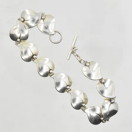 Armband bladformade länkar längd 20cm, bredd 13mm, T-lås, design troligen Hugo Grün Danmark, 925/1000 silver. Vikt: 22,1 g