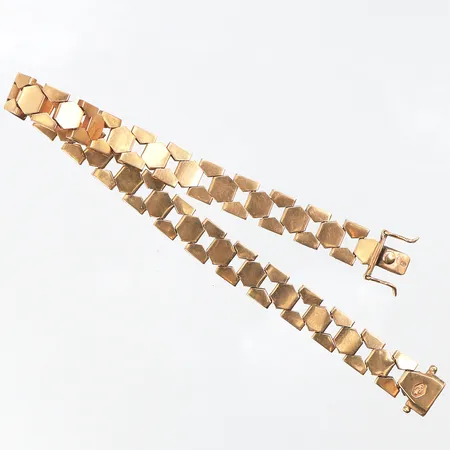 Armband längd ca 18.5 cm,bredd 7.5 mm,bruksslitage,18k. Vikt: 14,6 g