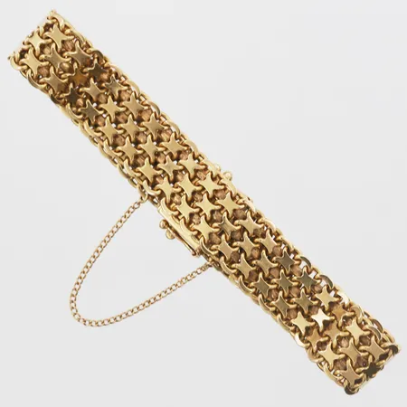 Armband, X-länk, S. Tiljander Söder-Guld AB, Stockholm år 1959, längd: 19 cm, bredd: 12 mm, integrerad säkerhetskedja, 18K guld. Vikt: 28,3 g
