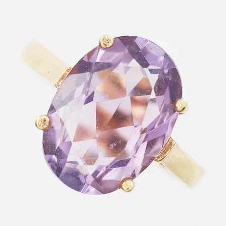 Ring med lila sten stl 17½, bredd 2-14mm, 18K Vikt: 3,2 g