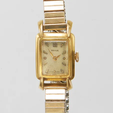 Damur Revue 18K, manuell, 21x17mm, flexband i stål, missfärgad urtavla, defekt, behov av service, bruttovikt 23,1g