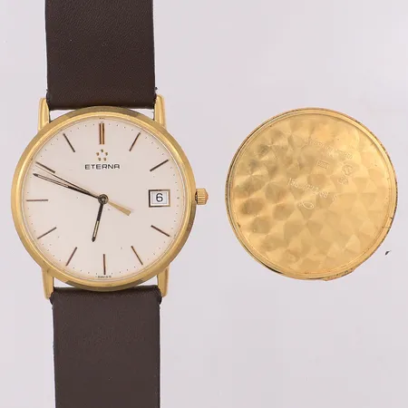 Herrur Eterna quartz datum Ø33mm 18K, tjänstegravyr, läder band, defekt lös baksida Vikt: 0 g