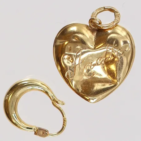 Guldskrot defekt gravyr 18K.  Vikt: 1,7 g