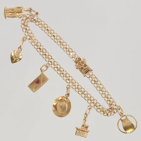 Armband Bismarck 16,5cm bredd 5mm, berlocker, 18K 9,6g.