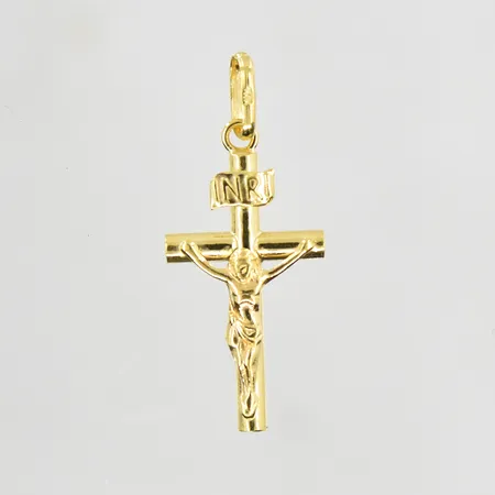Hänge krucifix längd 26mm bredd 11mm, 18K. Vikt: 0,7 g