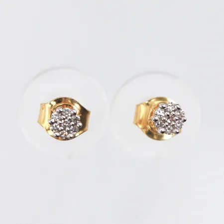 Örhängen paret med solitära diamanter,diameter ca 3.5 mm,18k. Vikt: 0,9 g