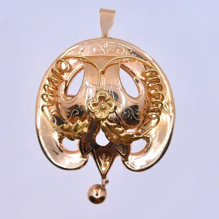 Hänge/brosch stl:52x36 mm, 18K. Vikt: 6,3 g