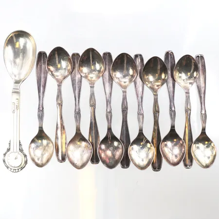 Skedar 11+1 st,längd ca 12-14 cm,silver 830/1000. Vikt: 183 g