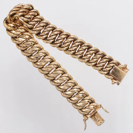 Armband med delvis mönsterdekor längd 18,5cm bredd 13,5mm, rödguld, ihålig, 18K Vikt: 32,1 g