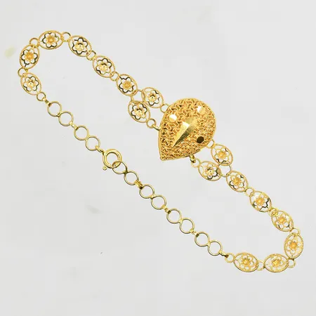 Armband filigran längd 16½-20cm, länkens bredd 5mm, 21K. Vikt: 7,1 g