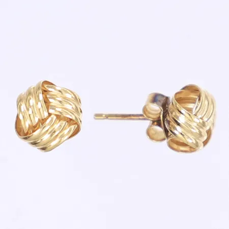 Ett par örhängen Ø6mm udda snurrebussar 18K  Vikt: 1,5 g