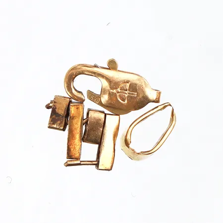 Trasigt guld 18k. Vikt: 1,2 g