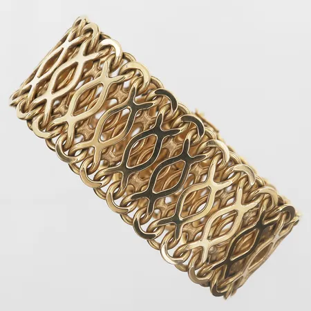 Armband längd 20cm bredd 30mm, Hellströmer,Jan, Saltsjöbaden år 1991, 18K.   Vikt: 114,9 g