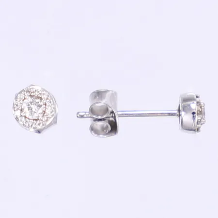 Ett par örhängen med diamanter 2x ca 0,05ct, 24x ca 0,005ct, Ø5mm, vitguld 18K Vikt: 1,2 g