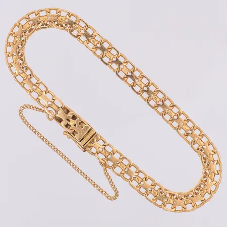 Armband X-länk Franzen 16,8cm bredd 5,7mm, säkerhetskedja, Bolidenguld 18K Vikt: 8,6 g