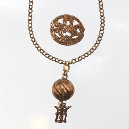 Brosch och collier Kalevala Koru,brons.