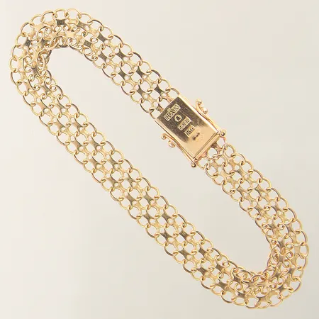 Armband X-länk längd 18cm bredd 8,5mm 18K Vikt: 8,9 g
