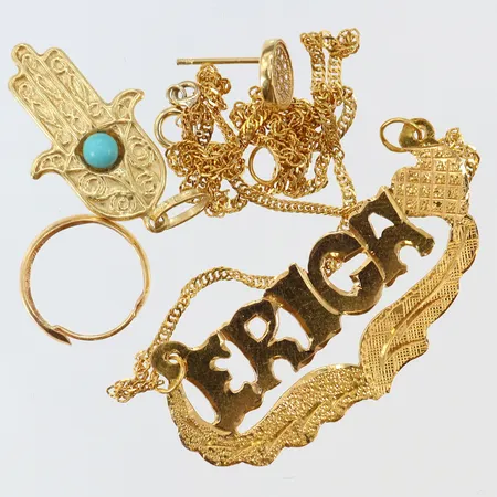 Guldskrot udda defekt 18K.  Vikt: 9,6 g