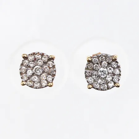 Örhängen paret med små diamanter,diameter ca 6.5 mm,18k. Vikt: 1,5 g