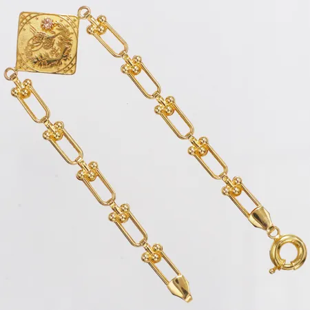 Armband med orange sten längd 18cm bredd 5-21mm, 21K  Vikt: 7,3 g