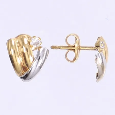 Ett par örhängen med vita stenar Ø7mm, vitguld/rödguld 18K Vikt: 0,7 g