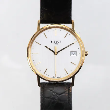 Herrur Tissot,gravyr,diameter ca 33.5 mm,fungerar ej,18k.