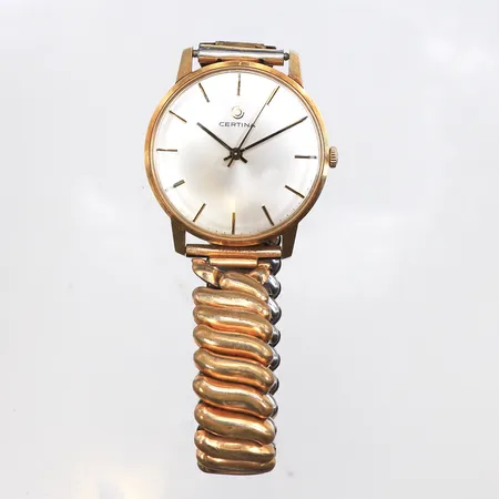 Herrur Certina,gravyr,diameter 34.9 mm,tickar igång men ej funktionstestad,14k i uret metall i armbandet,14k.