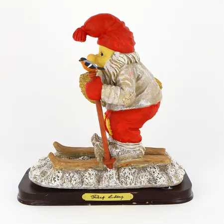 Figurin/ljusstake Rolf Lidberg höjd 23cm, längd 21cm, begränsad upplaga 0038/9000, träsockel med färgbortfall, originallåda.