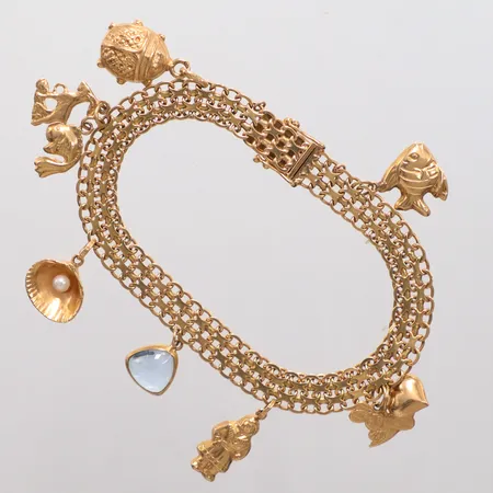 Armband x-länk med åtta berlocker längd 20, bredd 8mm, 18K Vikt: 18,2 g