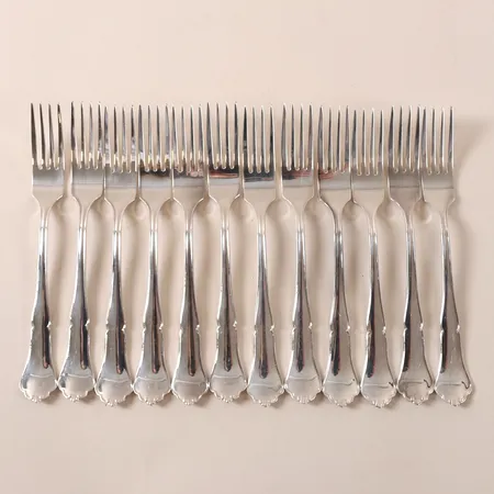 12 Gafflar modell Chippendale, längd 17,5cm, silver 925/1000 Vikt: 445 g