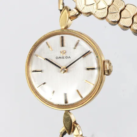 Damur Omega,fungerar ej,diameter 19.2 mm,14k i uret och metall i armbandet.