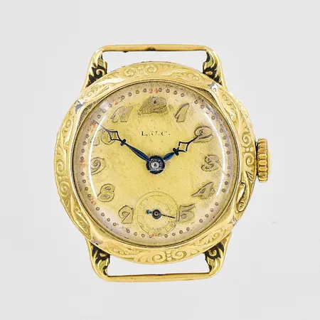 Damur L.U.C 14K Ø 21mm manuell , fungerar ej repigt plastglas band saknas