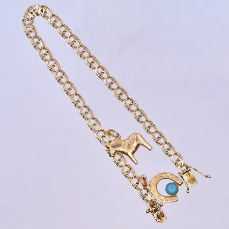 Armband Bismarck med 2 berlocker längd 19,5 cm, bredd 5 mm 18K. Vikt: 8,1 g