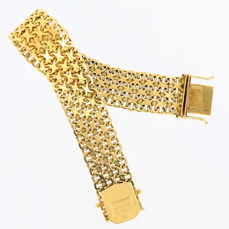 Armband X--länk 19cm, bredd 16mm, stämplad J&A, år 1963, kistlås, 18K Vikt: 37,3 g