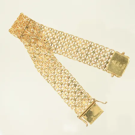 Armband X-länk med stav längd 18,5cm bredd 17mm, något ojämn, 18K 25,5g 