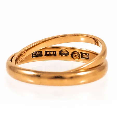 Två ringar skeva med gravyr 18K 5,5g. 