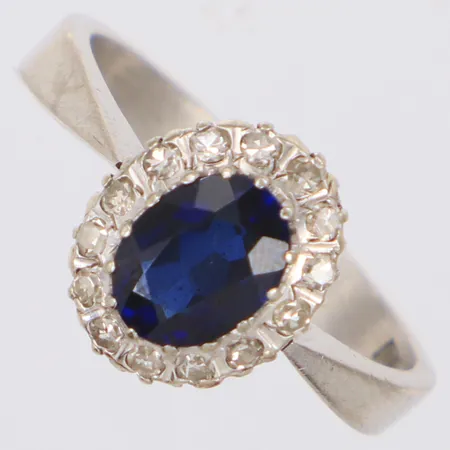 Ring med blå sten och diamanter 14xca0,02ct, repor, vitguld 18K 6,5g Vikt: 6,5 g