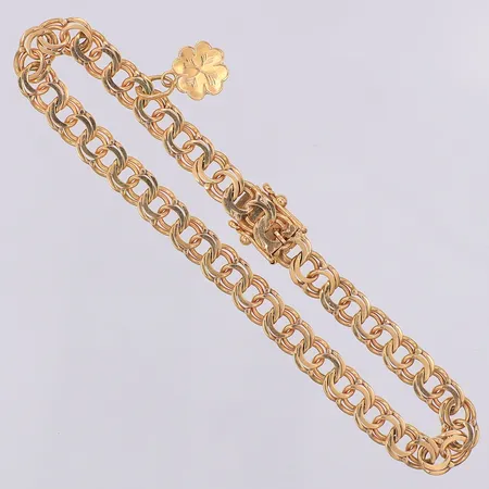 Armband Bismarck 18,5cm bredd:5mm, en berlock, 18K Vikt: 10 g