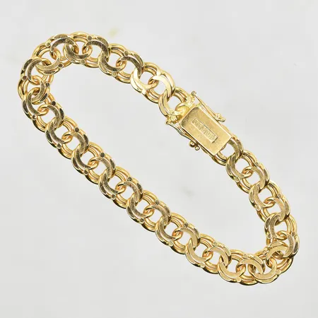 Armband Bismarck längd 20 cm bredd 9 mm, 18K. Vikt: 28,4 g