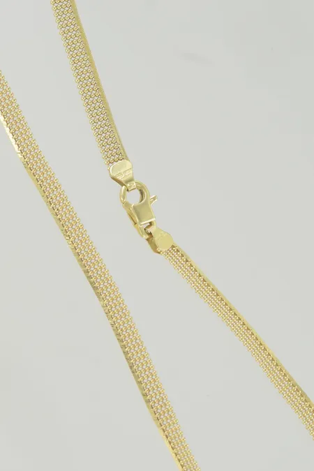 Halskedja i set längd 42,5 cm bredd 4,9 mm lite ojämn 18K Vikt: 13,5 g