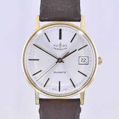 Herrur Perfecta quartz datum Ø33 mm, graverad boett 18K.